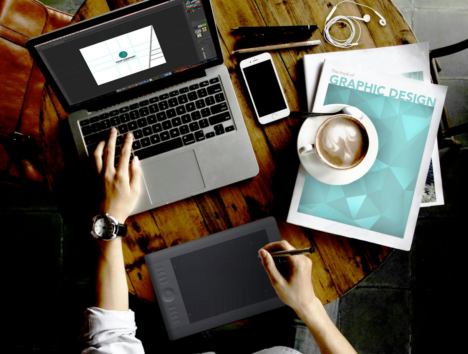 graphic designer working on a laptop